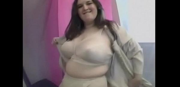  BBW brunette strips down to her birthday suit and plays with her cunt